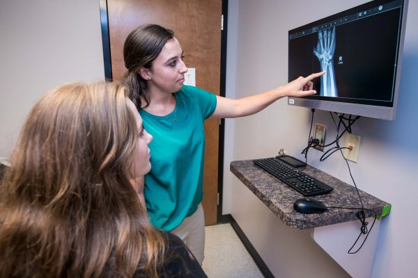 AT Resident Examines an Xray