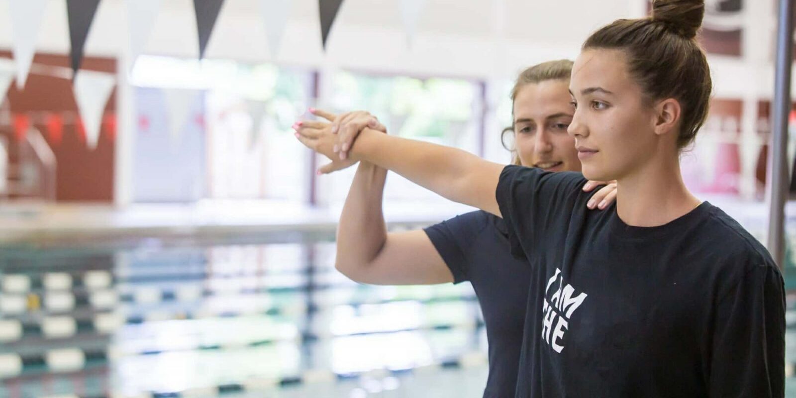 Athletic Trainer Positions Swimmer's Arm