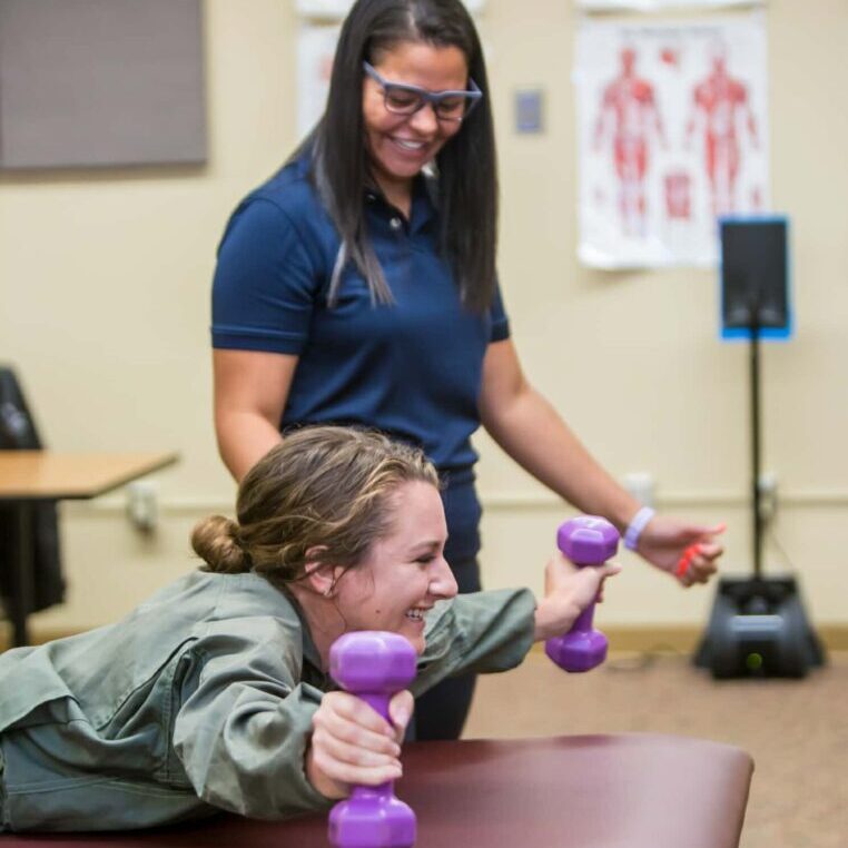 Athletic Training Session With Hand Weights